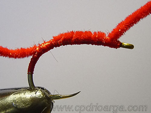 Anudamos en la cabeza y cortamos el hilo sobrante sanjuan5